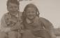 Preview: altes Negativ - Mädchen und Junge lachen in die Kamera und halten Hakenkreuz-Wimpel